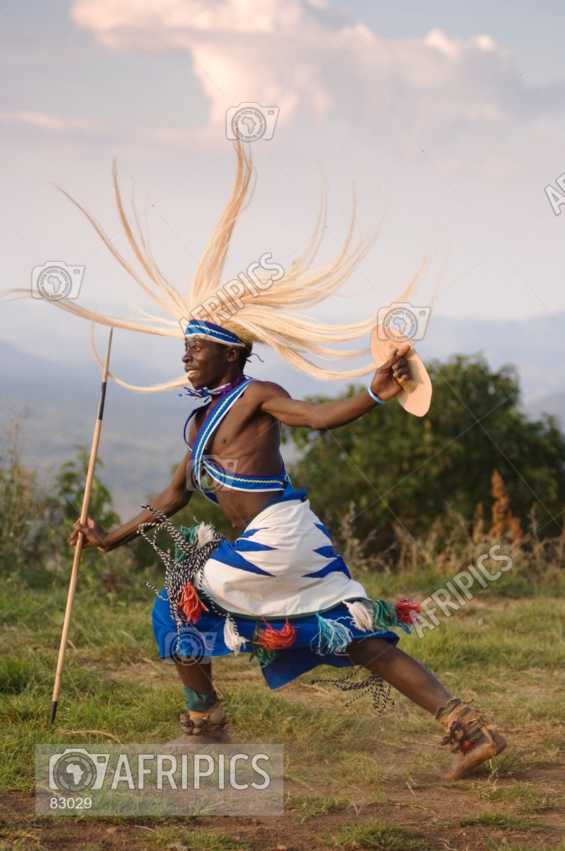 AFRIPICS - Intore dancer dressed in traditional costume holding shield ...